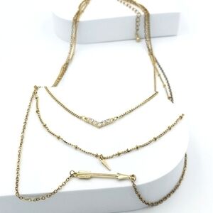 Gold Tone Layered Necklace with Arrow and Chevron Design